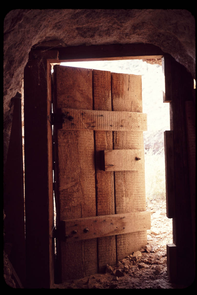 Photo by Larry Vredenburgh, Hart, California 1974. Open door to powder magazine looking out.