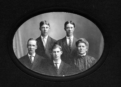 The John C. Thornburg family. Front: John C., Ross, Ida Back: Rolla & Clarence